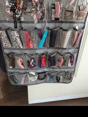 Fitbit Luxe Tracker And Approx 50 Assorted Bands